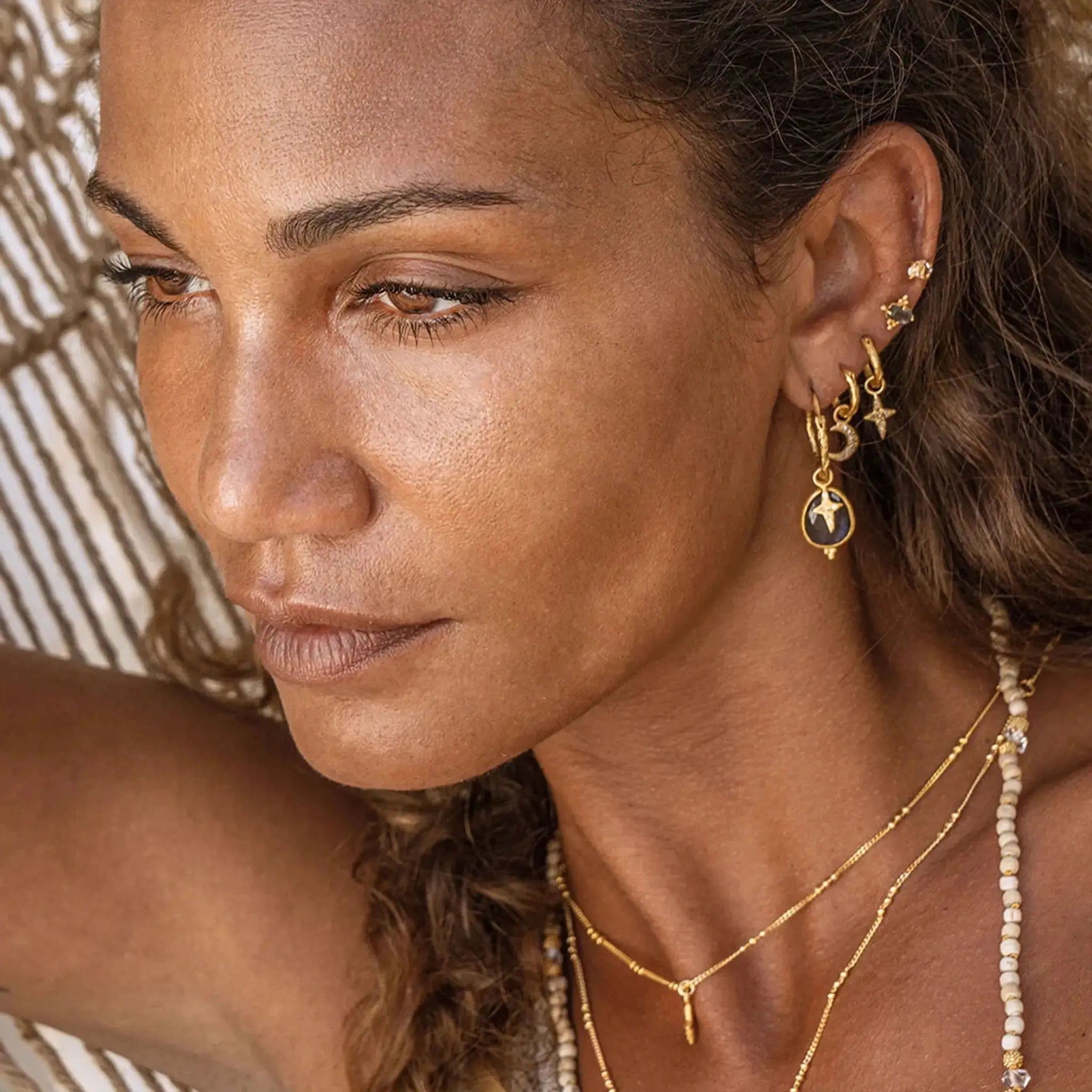 Gold hoop online earrings with stars